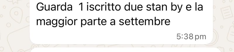 Client WhatsApp message reporting new sign-ups, with most expected in September.